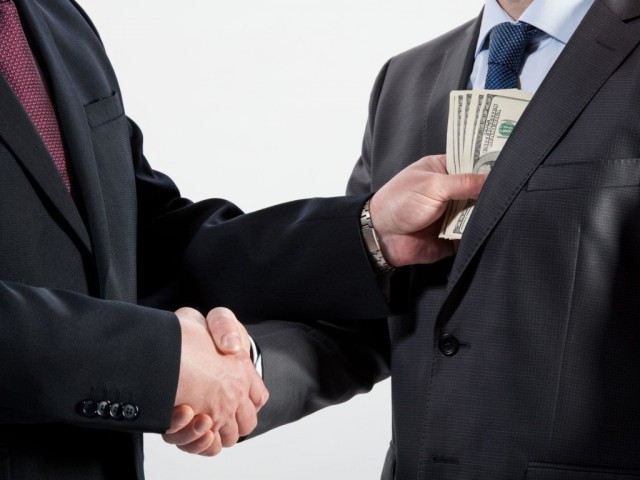 2 Corruption-bribe-5-x-7 (copy).-123rf