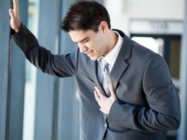 71 young-man-in-suit-with-chest-pain