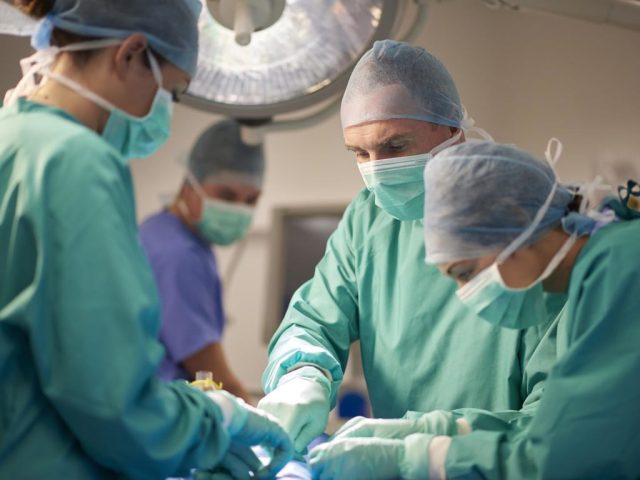 male and female surgeon during an operation