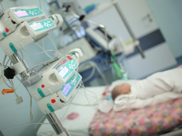 Child in the intensive care unit. Medical care concept