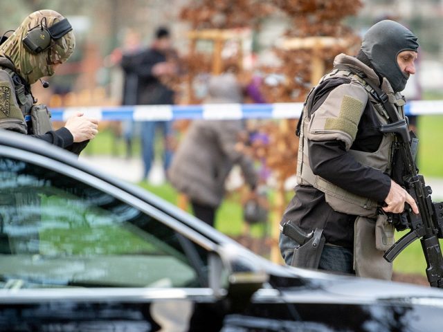 Police officers are seen near the site of a shooting in Ostrava